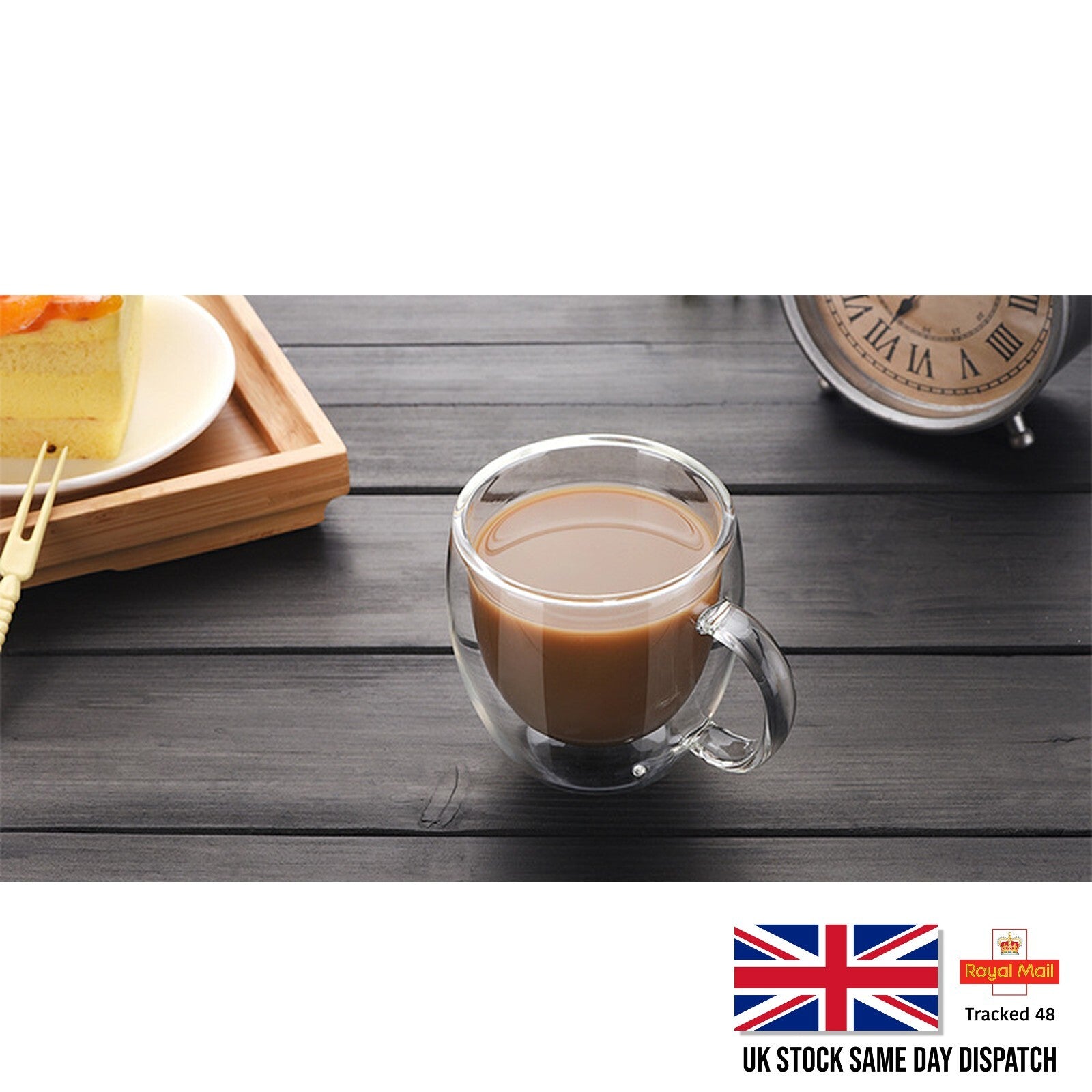 Glass mug with coffee on a wooden table with a clock and plate in the background